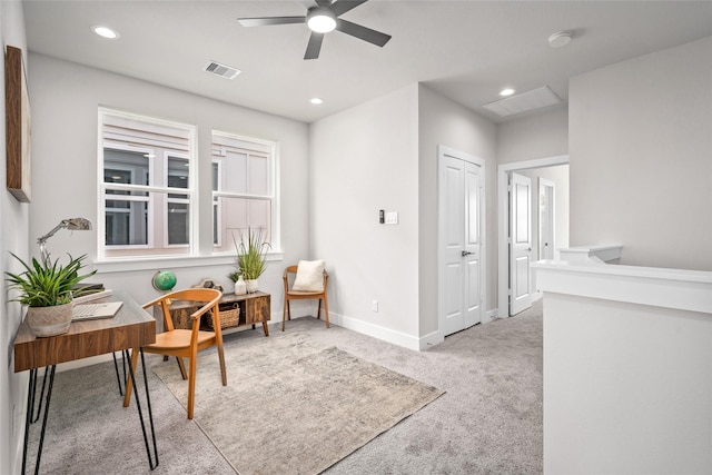 carpeted office space featuring ceiling fan, recessed lighting, and baseboards