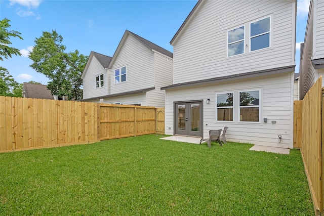 7228 Ave B, Houston, TX 77011 - back of house featuring french doors and a fenced backyard