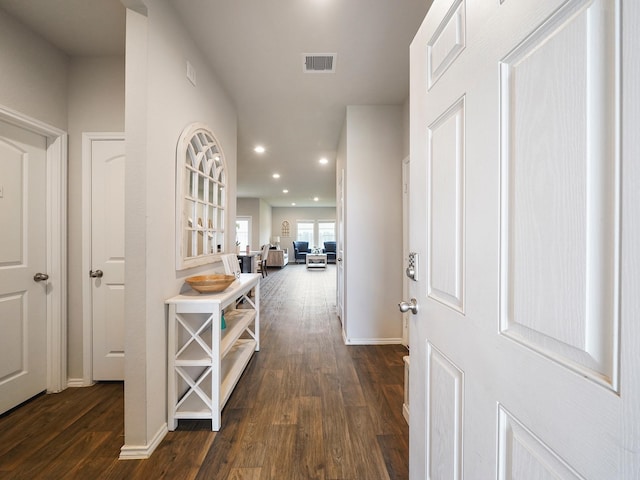 2423 Staverton Cir, Spring, TX 77373 - hallway featuring baseboards, dark wood-type flooring, visible vents, and recessed lighting