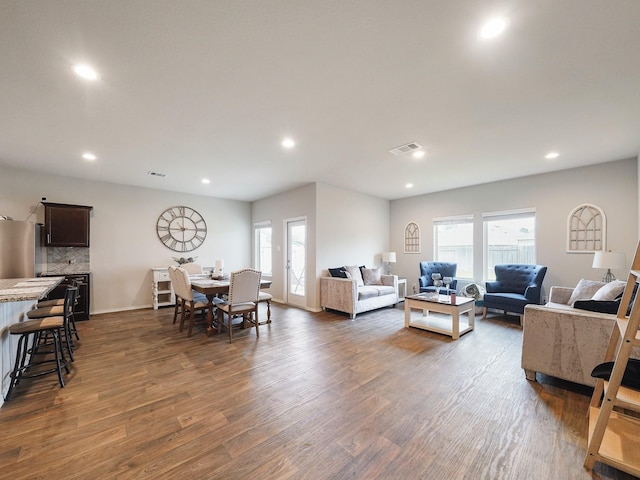2423 Staverton Cir, Spring, TX 77373 - living area featuring a wealth of natural light, visible vents, dark wood-style floors, and recessed lighting