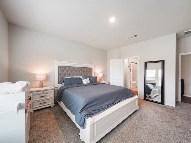2423 Staverton Cir, Spring, TX 77373 - bedroom with dark colored carpet, ensuite bathroom, and visible vents