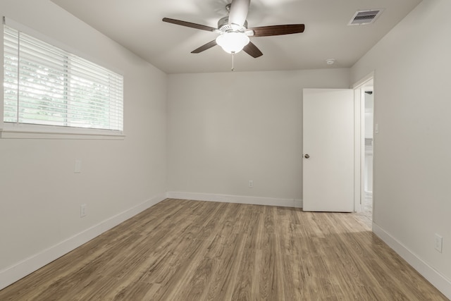 4206 Oak Shadows Dr, Houston, TX 77091 - spare room featuring baseboards, a ceiling fan, wood finished floors, and visible vents
