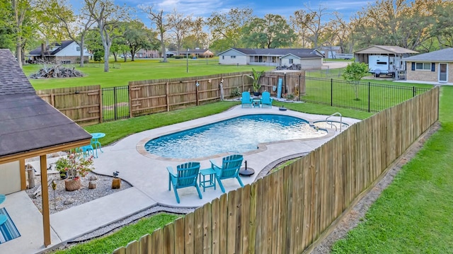 view of pool featuring a fenced backyard, a yard, a patio, a fenced in pool, and a residential view