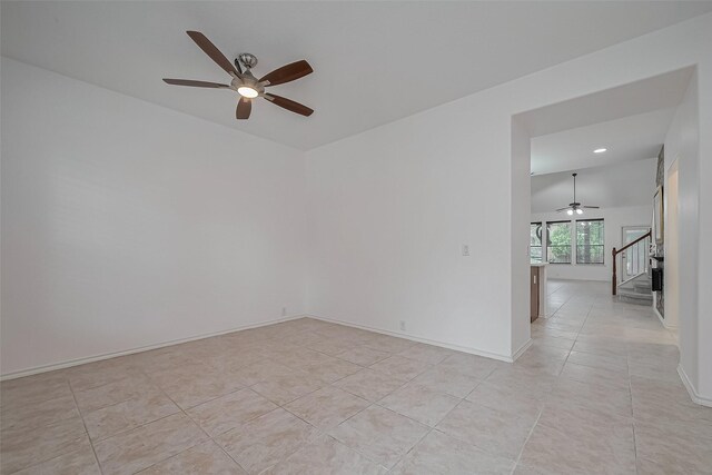 24543 Carlton Springs Ln, Katy, TX 77494 - empty room with ceiling fan, light tile patterned floors, stairs, recessed lighting, and baseboards