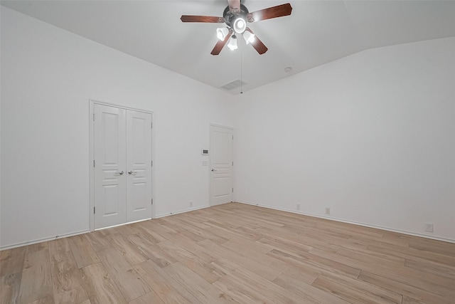 24543 Carlton Springs Ln, Katy, TX 77494 - spare room with ceiling fan, lofted ceiling, and light wood-type flooring