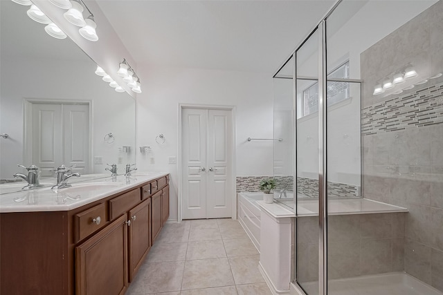 24543 Carlton Springs Ln, Katy, TX 77494 - full bath featuring a shower stall, a bath, double vanity, and tile patterned flooring