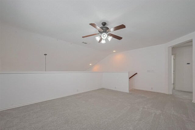 24543 Carlton Springs Ln, Katy, TX 77494 - empty room with ceiling fan, light colored carpet, vaulted ceiling, and recessed lighting