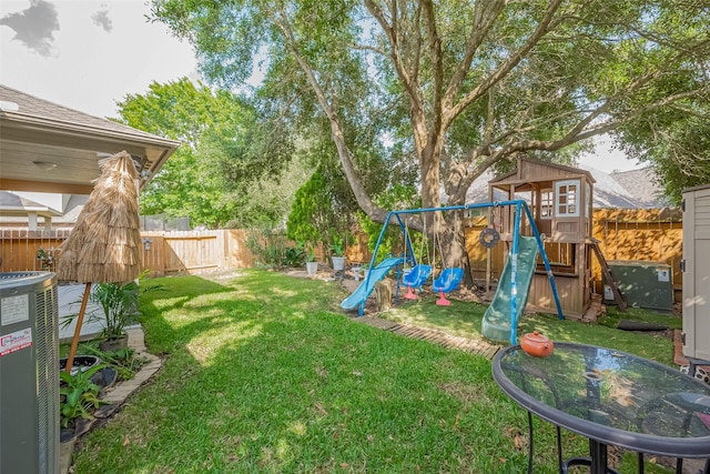 24543 Carlton Springs Ln, Katy, TX 77494 - view of yard with a playground and central AC unit