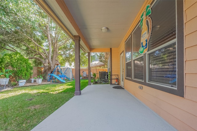 24543 Carlton Springs Ln, Katy, TX 77494 - view of patio / terrace featuring a playground and central AC