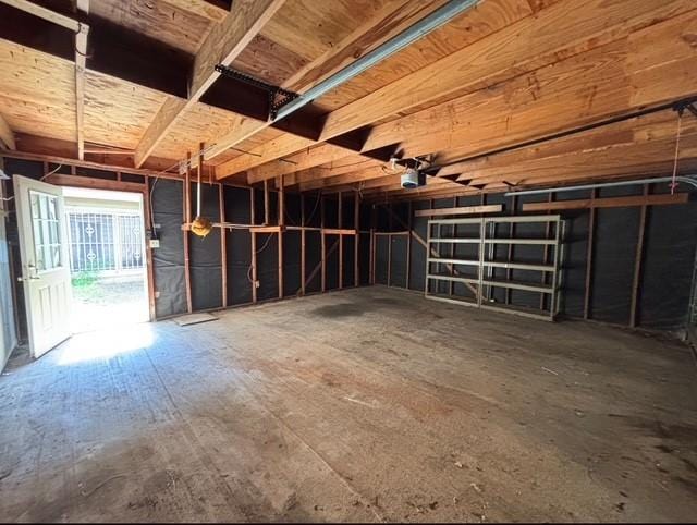 2332 Woodland Park Dr Unit 11, Houston, TX 77077 - garage featuring a garage door opener