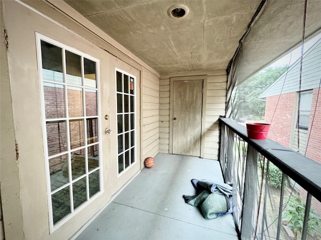 balcony featuring french doors