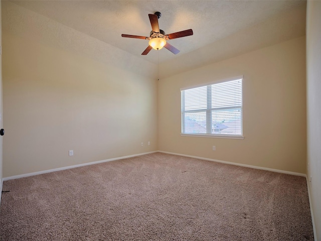 21315 Whistle Wood Dr, Richmond, TX 77406 - spare room with baseboards, a ceiling fan, and carpet