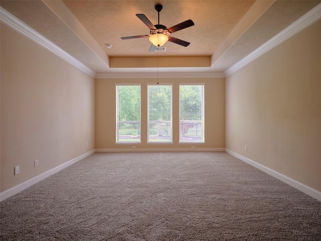 21315 Whistle Wood Dr, Richmond, TX 77406 - carpeted spare room featuring ceiling fan, baseboards, and a tray ceiling