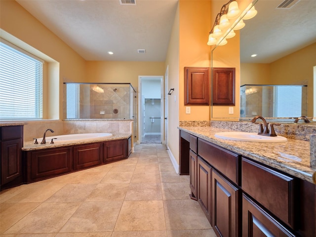 21315 Whistle Wood Dr, Richmond, TX 77406 - bathroom featuring a bath, vanity, visible vents, and a shower stall