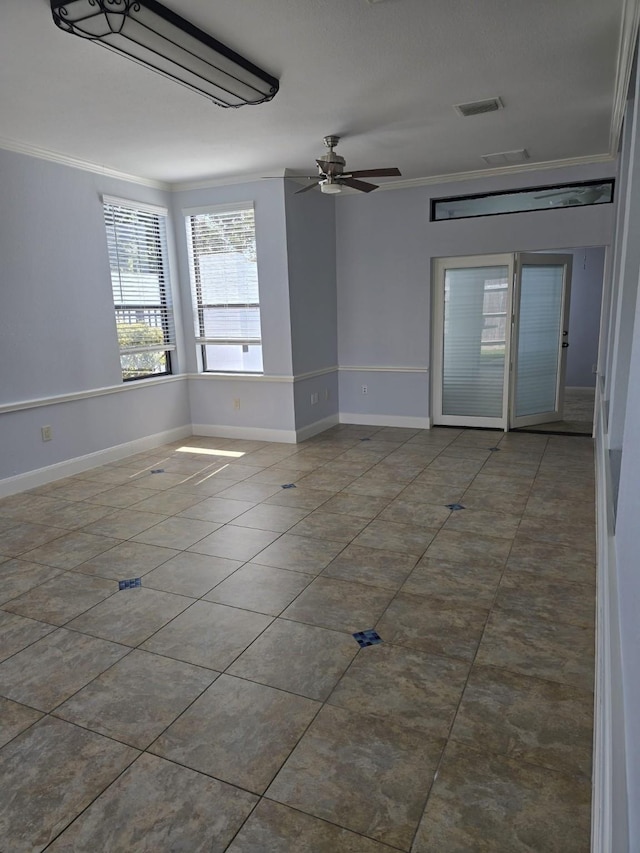 12203 Ashley Circle Dr E, Houston, TX 77071 - tiled spare room featuring crown molding, visible vents, a ceiling fan, and baseboards