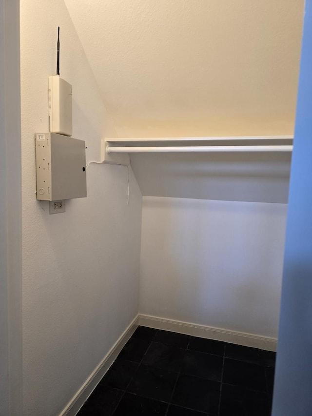 12203 Ashley Circle Dr E, Houston, TX 77071 - spacious closet with dark tile patterned flooring
