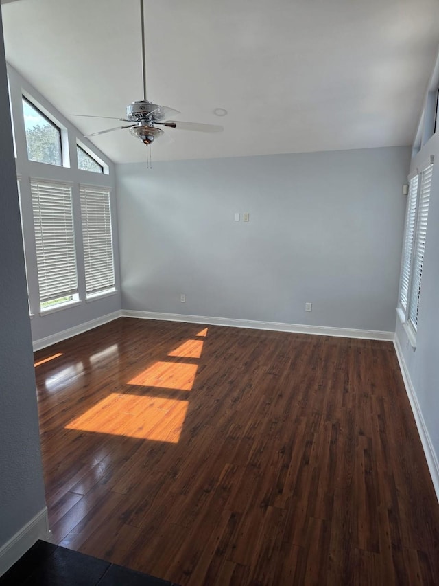 12203 Ashley Circle Dr E, Houston, TX 77071 - spare room with baseboards, vaulted ceiling, dark wood-style floors, and ceiling fan