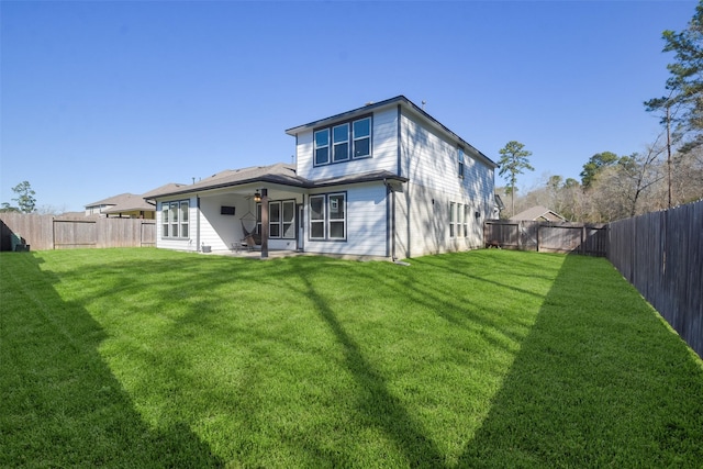 603 Companion Dr, Crosby, TX 77532 - back of property featuring a patio area, a lawn, and a fenced backyard