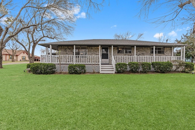 10 Hillcrest St, Point Blank, TX 77364 - view of front facade featuring brick siding, a porch, and a front yard