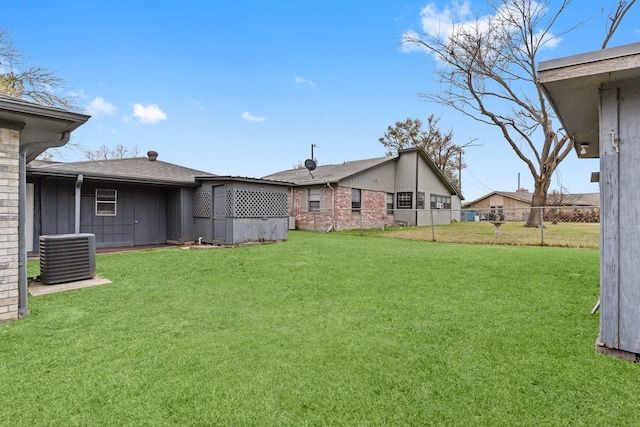 10 Hillcrest St, Point Blank, TX 77364 - view of yard with central AC unit and fence