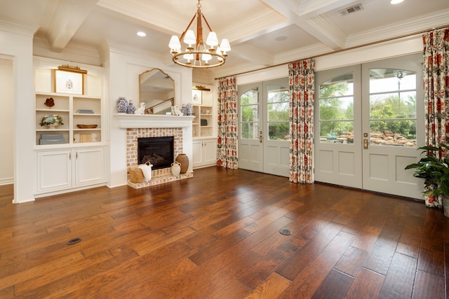 unfurnished living room with beamed ceiling, french doors, visible vents, and hardwood / wood-style flooring