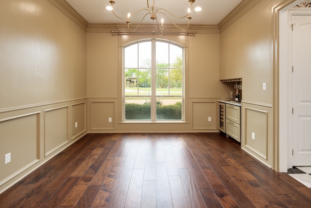 unfurnished dining area with a decorative wall, crown molding, dark wood-style flooring, and an inviting chandelier