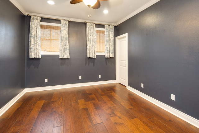 empty room featuring a healthy amount of sunlight, a ceiling fan, and ornamental molding