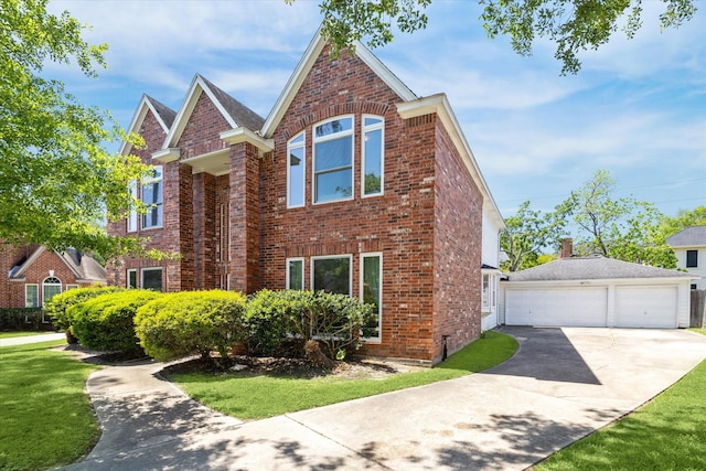 7930 Tizerton Ct, Spring, TX 77379 - traditional-style house featuring brick siding, a detached garage, and a front lawn
