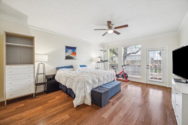 7930 Tizerton Ct, Spring, TX 77379 - bedroom featuring access to exterior, wood finished floors, ornamental molding, and a ceiling fan