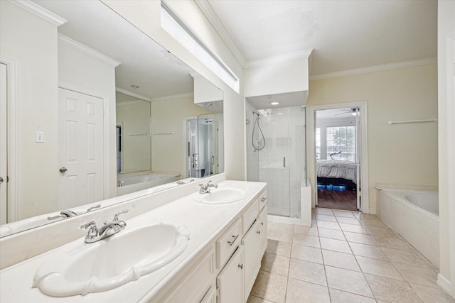 7930 Tizerton Ct, Spring, TX 77379 - ensuite bathroom featuring ornamental molding, a bath, a stall shower, double vanity, and tile patterned flooring