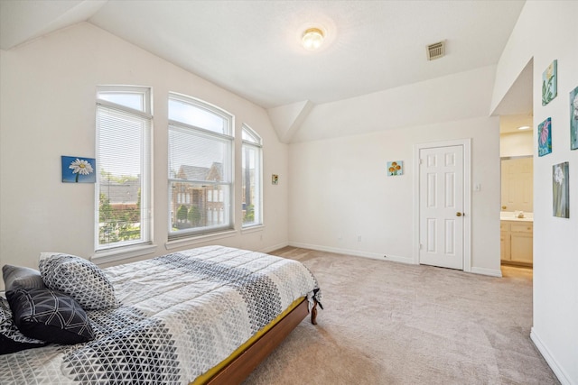 7930 Tizerton Ct, Spring, TX 77379 - carpeted bedroom featuring vaulted ceiling and baseboards