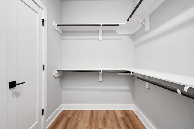 6817 Peerless St, Houston, TX 77021 - spacious closet featuring wood finished floors