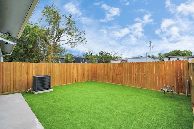 6817 Peerless St, Houston, TX 77021 - view of yard with central air condition unit and a fenced backyard