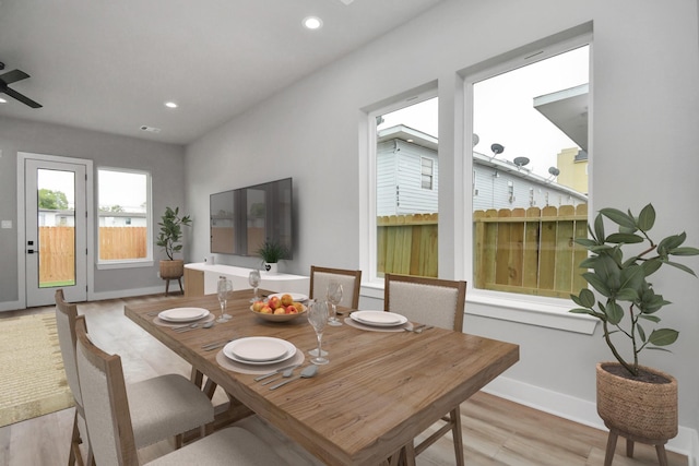 6817 Peerless St, Houston, TX 77021 - dining area with baseboards, light wood-style flooring, and recessed lighting