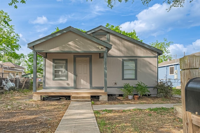 bungalow-style home featuring a porch
