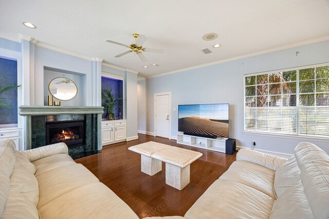 13602 Copeland Oaks Blvd, Cypress, TX 77429 - living room with dark wood-style floors, ceiling fan, a fireplace, baseboards, and recessed lighting