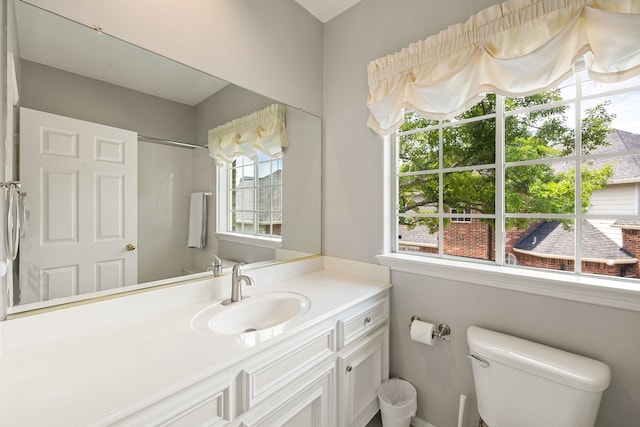 full bath with vanity and toilet