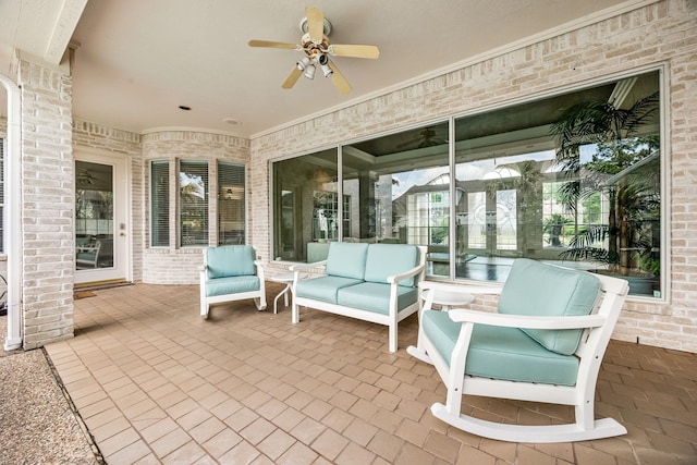 view of patio featuring ceiling fan and an outdoor living space