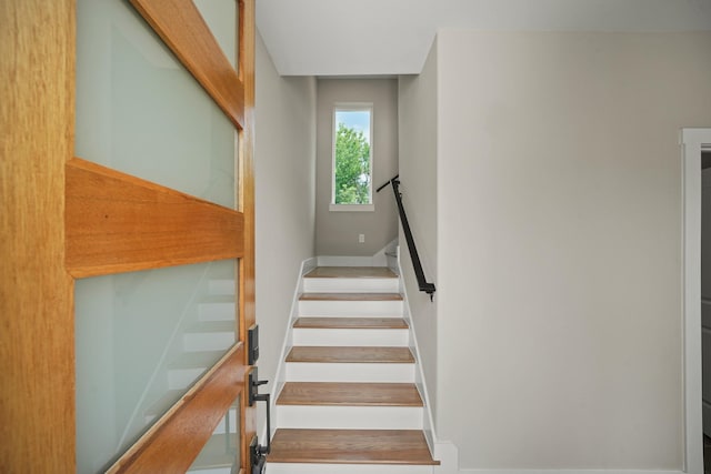 stairway with baseboards