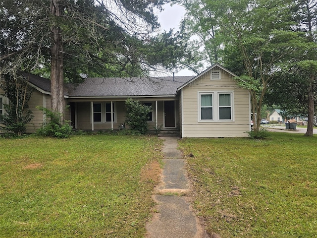 single story home featuring a front yard