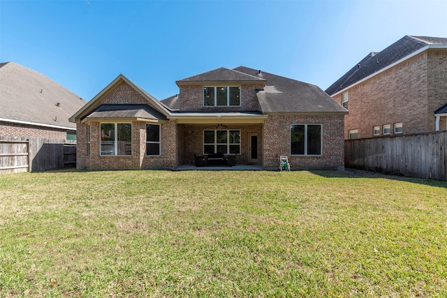 5002 Sawmill Terrace Ln, Spring, TX 77389 - back of house with brick siding, a ceiling fan, a patio, and an outdoor living space