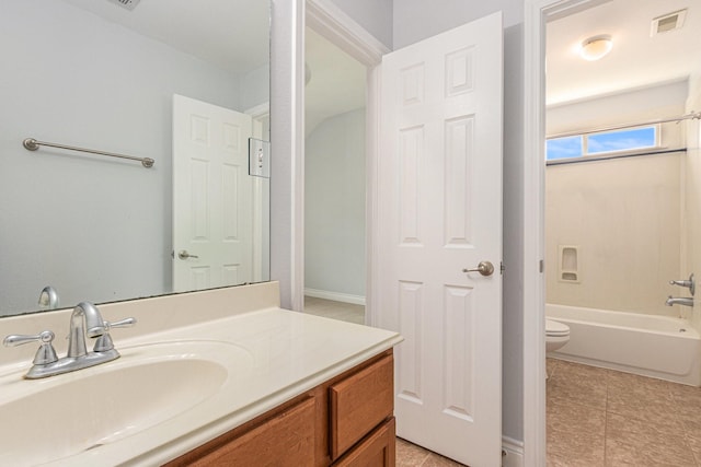 full bath with toilet, vanity, tile patterned floors, and visible vents