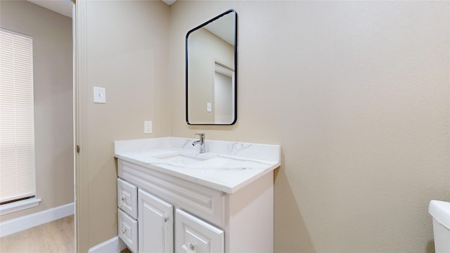 7126 Rio Blanco Dr, Houston, TX 77083 - bathroom featuring baseboards, vanity, and toilet