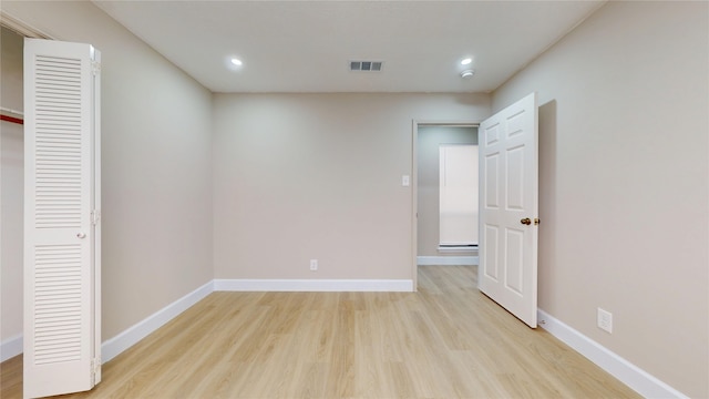 7126 Rio Blanco Dr, Houston, TX 77083 - unfurnished bedroom featuring baseboards, recessed lighting, visible vents, and light wood-type flooring