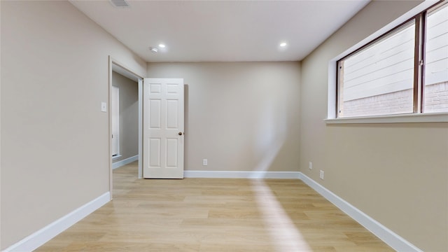 7126 Rio Blanco Dr, Houston, TX 77083 - spare room with baseboards, recessed lighting, and light wood-type flooring