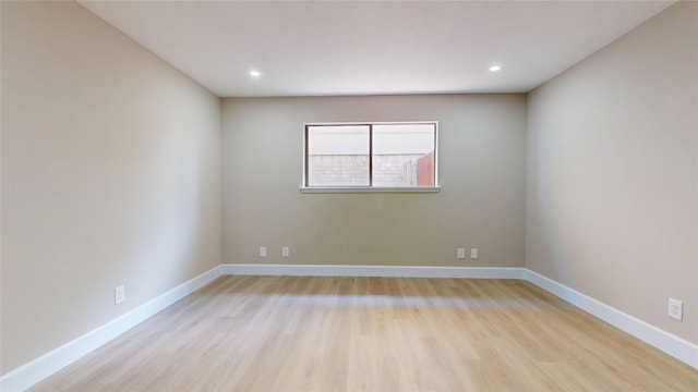 7126 Rio Blanco Dr, Houston, TX 77083 - unfurnished room featuring light wood finished floors, baseboards, and recessed lighting