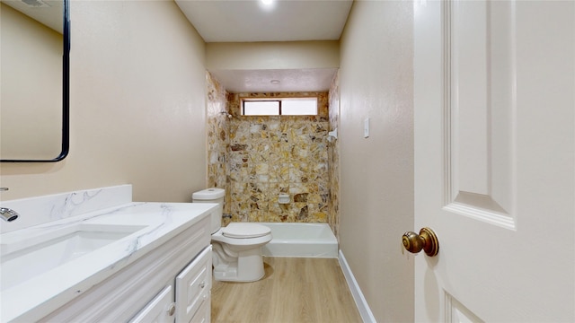 7126 Rio Blanco Dr, Houston, TX 77083 - full bath with a shower stall, wood finished floors, toilet, vanity, and baseboards
