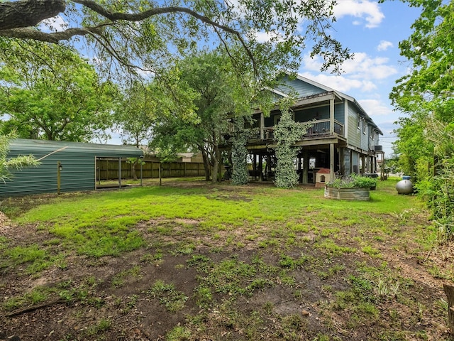 939 17th St, San Leon, TX 77539 - view of yard featuring a deck