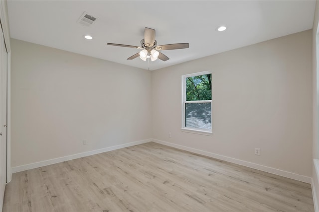unfurnished room with visible vents, recessed lighting, light wood-style flooring, and ceiling fan
