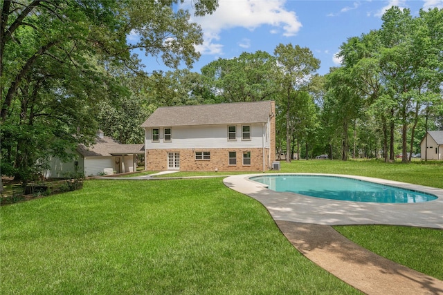 outdoor pool with a lawn